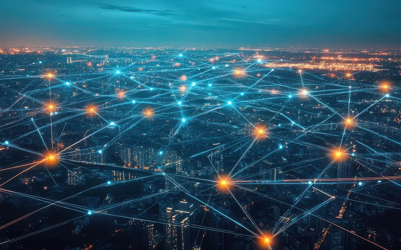 An aerial view of a city at night overlaid with a connected network of light